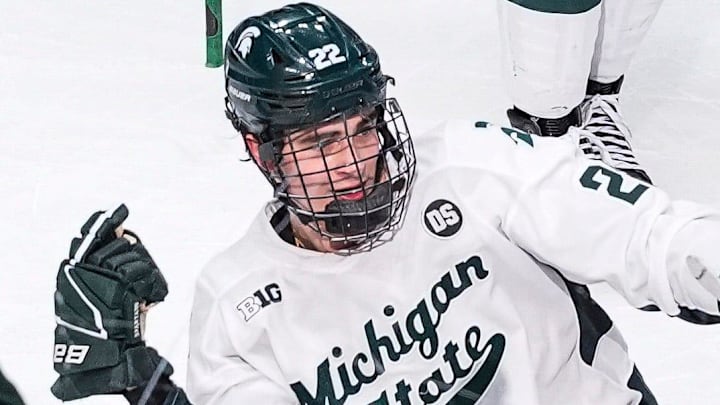 Michigan State forward Porter Martone (22) celebrates scoring a goal against Michigan during the first period of Duel in the D at Little Caesars Arena in Detroit on Saturday, February 7, 2026. Michigan State forward Porter Martone (22) celebrates scoring a goal against Michigan during the first period of Duel in the D at Little Caesars Arena in Detroit on Saturday, February 7, 2026.