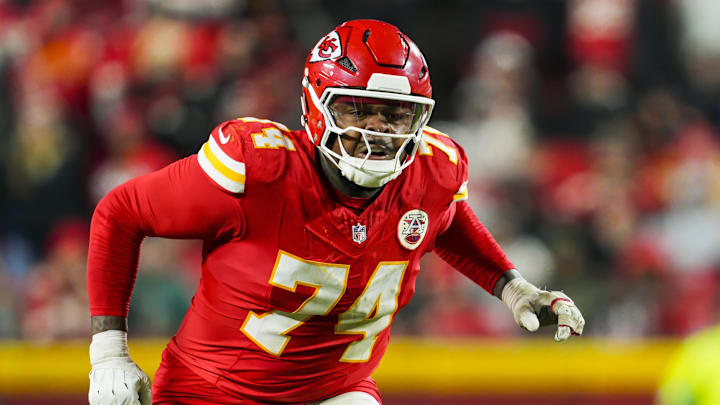 Dec 8, 2024; Kansas City, Missouri, USA; Kansas City Chiefs offensive tackle Jawaan Taylor (74) gets ready to block during the second half against the Los Angeles Chargers at GEHA Field at Arrowhead Stadium. Mandatory Credit: Jay Biggerstaff-Imagn Images