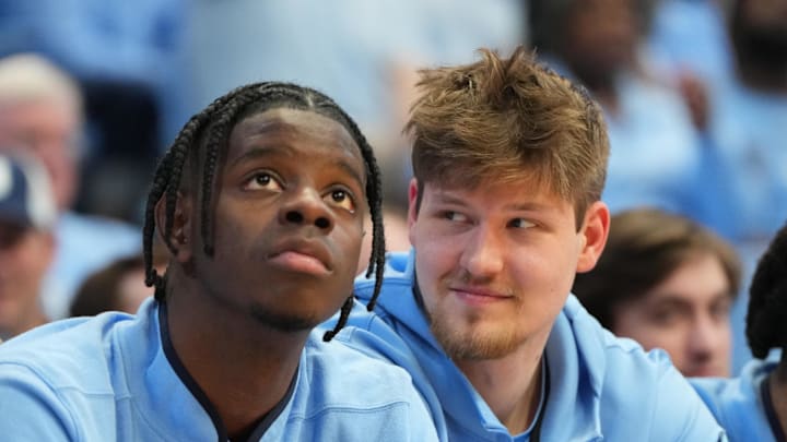 Feb 14, 2026; Chapel Hill, North Carolina, USA; North Carolina Tar Heels forward Caleb Wilson (8) and center Henri Veesaar (13) on the bench in the second half at Dean E. Smith Center. Mandatory Credit: Bob Donnan-Imagn Images Feb 14, 2026; Chapel Hill, North Carolina, USA; North Carolina Tar Heels forward Caleb Wilson (8) and center Henri Veesaar (13) on the bench in the second half at Dean E. Smith Center. Mandatory Credit: Bob Donnan-Imagn Images