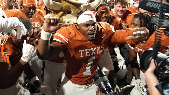 Texas Longhorns defensive end Colin Simmons (1) celebrates with teammates after defeating the against the Ohio State Buckeyes at Darrell K Royal-Texas Memorial Stadium. Texas Longhorns defensive end Colin Simmons (1) celebrates with teammates after defeating the against the Ohio State Buckeyes at Darrell K Royal-Texas Memorial Stadium.