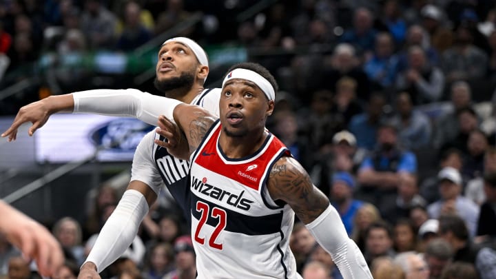 Feb 12, 2024; Dallas, Texas, USA; Dallas Mavericks center Daniel Gafford (21) and Washington Wizards forward Richaun Holmes (22) battle for position under the basket during the second half at the American Airlines Center. Mandatory Credit: Jerome Miron-USA TODAY Sports