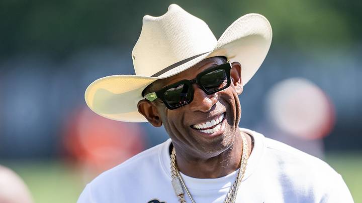 Jul 30, 2026; Berea, OH, USA; Cleveland Browns quarterback Shedeur Sanders (2) talks with his father Deion Sanders during training camp at CrossCountry Mortgage Campus. Jul 30, 2026; Berea, OH, USA; Cleveland Browns quarterback Shedeur Sanders (2) talks with his father Deion Sanders during training camp at CrossCountry Mortgage Campus.