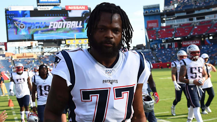 Aug 17, 2019; Nashville, TN, USA; New England Patriots defensive end Michael Bennett (77) leaves the field after warmups before the preseason game against the Tennessee Titans at Nissan Stadium. Mandatory Credit: Christopher Hanewinckel-Imagn Images