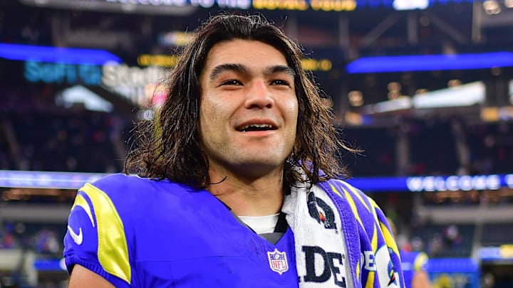 Dec 8, 2024; Inglewood, California, USA; Los Angeles Rams wide receiver Puka Nacua (17) celebrates the victory against the Buffalo Bills at SoFi Stadium. Mandatory Credit: Gary A. Vasquez-Imagn Images