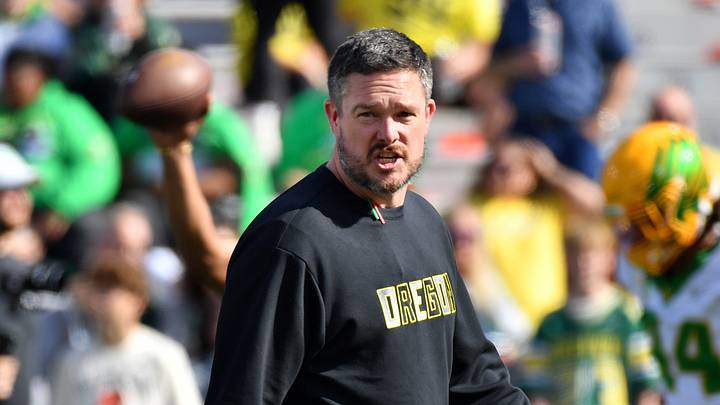Oct 24, 2026; Champaign, Illinois, USA; Oregon Ducks head coach Dan Lanning watches his team before a game against the Illinois Fighting Illini at Gies Memorial Stadium. Mandatory Credit: Ron Johnson-Imagn Images Oct 24, 2026; Champaign, Illinois, USA; Oregon Ducks head coach Dan Lanning watches his team before a game against the Illinois Fighting Illini at Gies Memorial Stadium. Mandatory Credit: Ron Johnson-Imagn Images