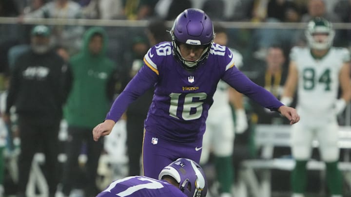Oct 6, 2024; London, United Kingdom; Minnesota Vikings place kicker Will Reichard (16) kicks a 41-yard field goal out of the hold of punter Ryan Wright (17) in the fourth quarter against the New York Jets at Tottenham Hotspur Stadium.