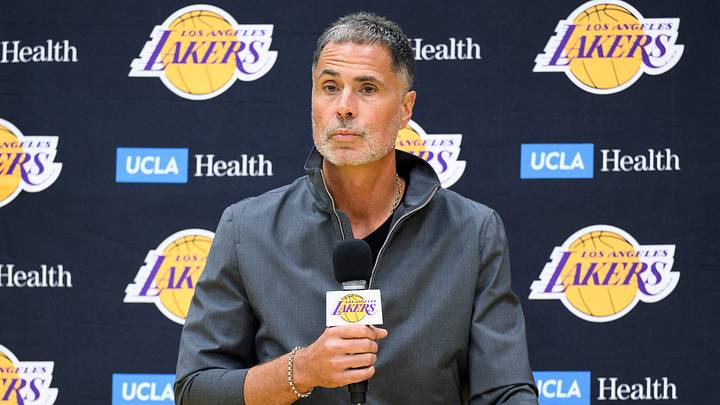 Sep 25, 2025; El Segundo, CA, USA; Los Angeles Lakers general manager Rob Pelinka, left, speaks during a press conference to preview the 2025-26 season at UCLA Health Training Center. Mandatory Credit: William Liang-Imagn Images