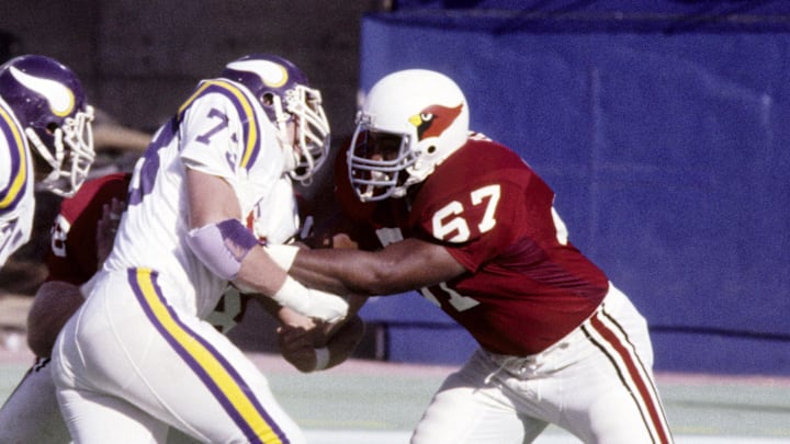 Oct 30, 1983; St. Louis, MO, USA; FILE PHOTO; St. Louis Cardinals tackle Luis Sharpe (67) in action against the Minnesota Vikings at Busch Stadium. The Cardinals defeated the Vikings 41-31. Mandatory Credit: Herb Weitman-Imagn Images