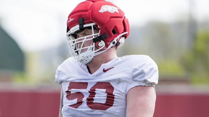 Arkansas Razorbacks offensive lineman Kobe Branham (50) gets back in line for the next drill during spring practice at the Arkansas Razorbacks practice facilities. Arkansas Razorbacks offensive lineman Kobe Branham (50) gets back in line for the next drill during spring practice at the Arkansas Razorbacks practice facilities.