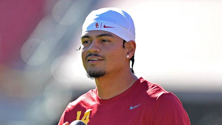 Oct 11, 2025; Los Angeles, California, USA;  USC Trojans quarterback Jayden Maiava (14) warms up prior to the game against the Michigan Wolverines at United Airlines Field at the Los Angeles Memorial Coliseum. Mandatory Credit: Jayne Kamin-Oncea-Imagn Images