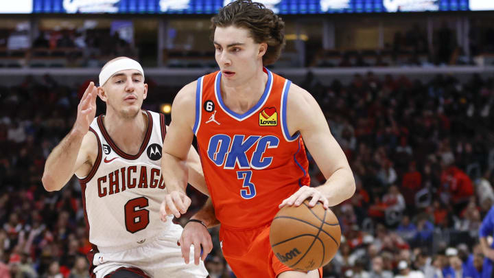 Jan 13, 2023; Chicago, Illinois, USA; Oklahoma City Thunder guard Josh Giddey (3) drives to the basket against Chicago Bulls guard Alex Caruso (6) during the second half at United Center. Mandatory Credit: Kamil Krzaczynski-USA TODAY Sports Jan 13, 2023; Chicago, Illinois, USA; Oklahoma City Thunder guard Josh Giddey (3) drives to the basket against Chicago Bulls guard Alex Caruso (6) during the second half at United Center. Mandatory Credit: Kamil Krzaczynski-USA TODAY Sports