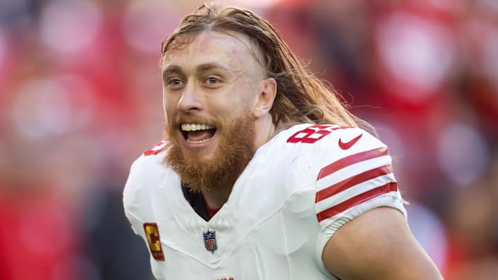 Jan 5, 2025; Glendale, Arizona, USA; San Francisco 49ers tight end George Kittle (85) against the Arizona Cardinals at State Farm Stadium. Mandatory Credit: Mark J. Rebilas-Imagn Images