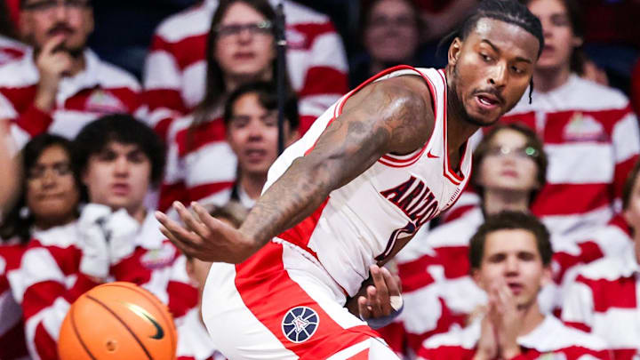 Dec 16, 2025; Tucson, Arizona, USA; Arizona Wildcats guard Jaden Bradley (0) passes the ball during the second half of the game against the Abilene Christian Wildcats at McKale Memorial Center. Mandatory Credit: Aryanna Frank-Imagn Images