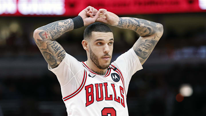 Dec 8, 2024; Chicago, Illinois, USA; Chicago Bulls guard Lonzo Ball (2) reacts during the second half of a basketball game against the Philadelphia 76ers at United Center. Mandatory Credit: Kamil Krzaczynski-Imagn Images