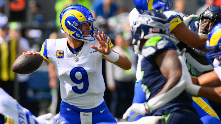 Sep 10, 2023; Seattle, Washington, USA; Los Angeles Rams quarterback Matthew Stafford (9) passes the ball against the Seattle Seahawks during the first half at Lumen Field. Sep 10, 2023; Seattle, Washington, USA; Los Angeles Rams quarterback Matthew Stafford (9) passes the ball against the Seattle Seahawks during the first half at Lumen Field.
