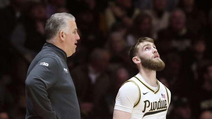 Purdue Boilermakers head coach Matt Painter talks to guard Braden Smith Purdue Boilermakers head coach Matt Painter talks to guard Braden Smith