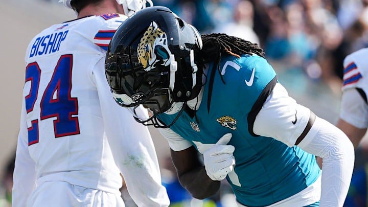 Jacksonville Jaguars wide receiver Brian Thomas Jr. (7) spins the ball after scoring a touchdown during the first quarter in an NFL football AFC Wild Card playoff matchup, Sunday, Jan. 11, 2026, in Jacksonville, Fla. Bills lead 10-7 at the half over the Jaguars. [Doug Engle/Florida Times-Union]
