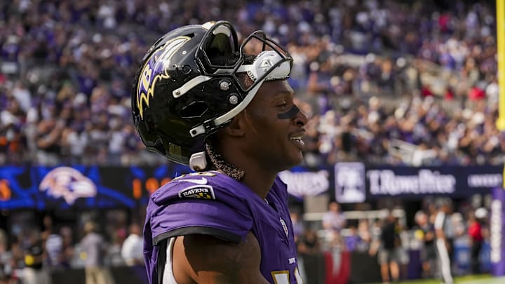 Sep 14, 2025; Baltimore, Maryland, USA; Baltimore Ravens wide receiver DeAndre Hopkins (10) shakes hands with Baltimore Ravens wide receiver Rashod Bateman (7) after making a catch for a touchdown during the fourth quarter at M&T Bank Stadium. Mandatory Credit: Mitch Stringer-Imagn Images