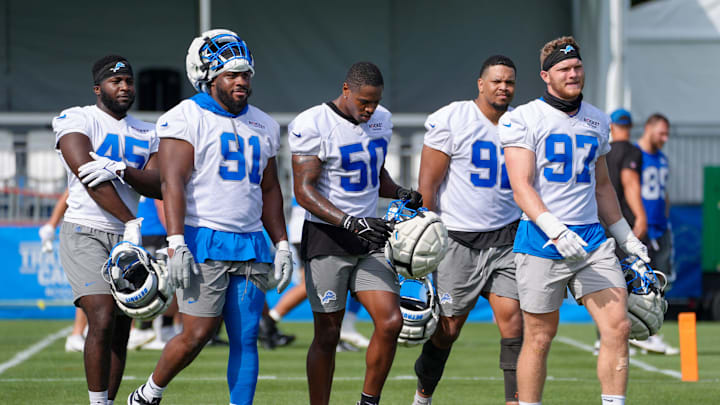 Lions d-linemen Issac Ukwu, Levi Onwuzurike, LB Mitchell Agude, Marcus Davenport and Aidan Hutchinson walk off the field Lions d-linemen Issac Ukwu, Levi Onwuzurike, LB Mitchell Agude, Marcus Davenport and Aidan Hutchinson walk off the field