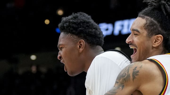 Mar 23, 2025; Seattle, WA, USA; Maryland Terrapins center Derik Queen (25) celebrates with teammates after scoring the game-winning shot against the Colorado State Rams at Climate Pledge Arena. Mandatory Credit: Stephen Brashear-Imagn Images