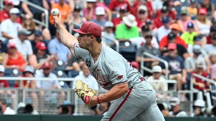 Jun 16, 2025; Omaha, Neb, USA;  Arkansas Razorbacks starting pitcher Gage Wood (14) throws against the Murray State Racers during the first inning at Charles Schwab Field. Mandatory Credit: Steven Branscombe-Imagn Images