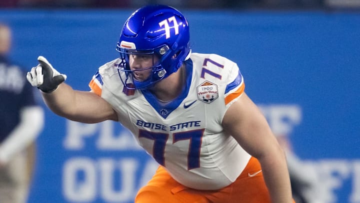 Dec 31, 2024; Glendale, AZ, USA; Boise State Broncos offensive tackle Kage Casey (77) against the Penn State Nittany Lions during the Fiesta Bowl at State Farm Stadium. 