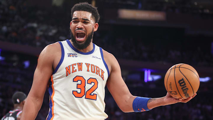 Dec 21, 2025; New York, New York, USA;  New York Knicks center Karl-Anthony Towns (32) reacts to a call in the fourth quarter against the Miami Heat at Madison Square Garden. Mandatory Credit: Wendell Cruz-Imagn Images