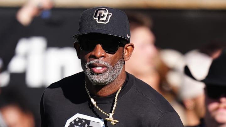 Nov 16, 2024; Boulder, Colorado, USA; Colorado Buffaloes head coach Deion Sanders looks on before the game against the Utah Utes at Folsom Field. Nov 16, 2024; Boulder, Colorado, USA; Colorado Buffaloes head coach Deion Sanders looks on before the game against the Utah Utes at Folsom Field.