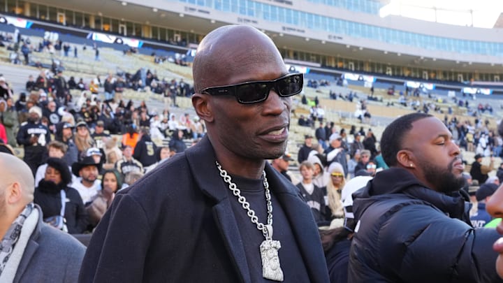 Nov 16, 2024; Boulder, Colorado, USA; Retired American football player Chad Johnson on the sidelines before the game between the Utah Utes against the Colorado Buffaloes at Folsom Field. Mandatory Credit: Ron Chenoy-Imagn Images
