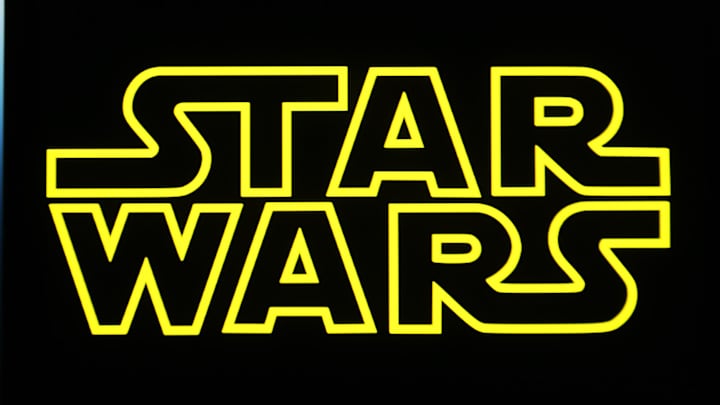 In this photo illustration, a Star Wars logo is seen on a...