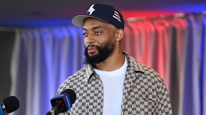 Mar 13, 2025; Foxborough, MA, USA; New England Patriots cornerback Carlton Davis III discusses his recent free agent addition to the Patriots with the media at Gillette Stadium. Mandatory Credit: Eric Canha-Imagn Images Mar 13, 2025; Foxborough, MA, USA; New England Patriots cornerback Carlton Davis III discusses his recent free agent addition to the Patriots with the media at Gillette Stadium. Mandatory Credit: Eric Canha-Imagn Images