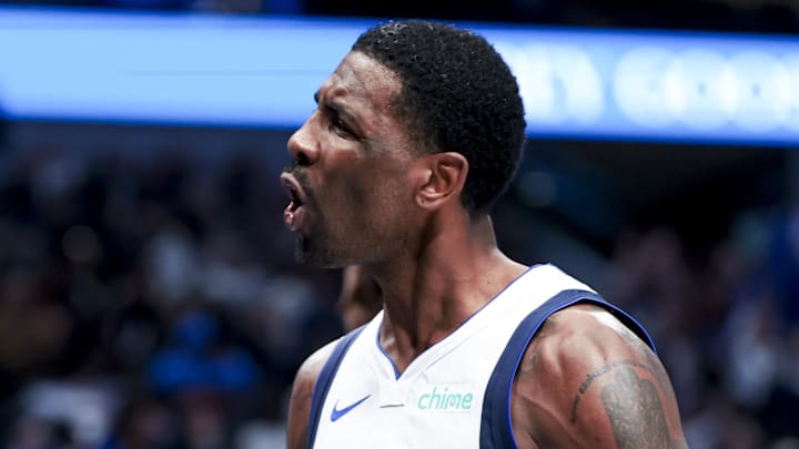 Feb 27, 2025; Dallas, Texas, USA;  Dallas Mavericks guard Kyrie Irving (11) reacts after scoring against the Charlotte Hornets during the second half at American Airlines Center. Mandatory Credit: Kevin Jairaj-Imagn Images