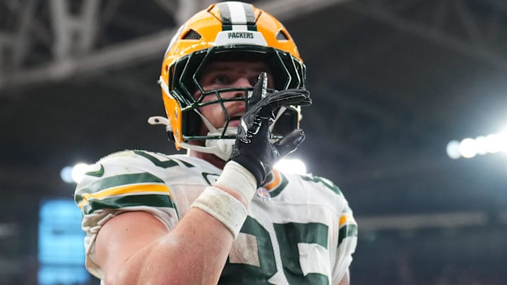 Green Bay Packers tight end Tucker Kraft (85) celebrates a touchdown against the Arizona Cardinals during the second half at State Farm Stadium.