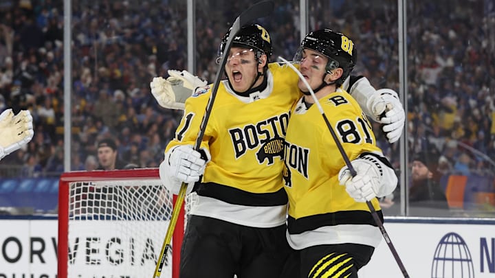 Feb 1, 2026; Tampa Bay, Florida, USA; Boston Bruins center Alex Steeves (21) reacts with center Michael Eyssimont (81) after scoring a goal during the first period against the Tampa Bay Lightning in the 2026 Stadium Series ice hockey game at Raymond James Stadium. Mandatory Credit: Kim Klement Neitzel-Imagn Images