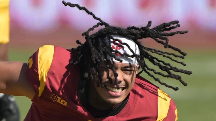 Oct 12, 2024; Los Angeles, California, USA;  USC Trojans wide receiver Makai Lemon (6) lost his helmet after a first down before he is stopped by Penn State Nittany Lions linebacker Kobe King (41) in the second half at United Airlines Field at the Los Angeles Memorial Coliseum.