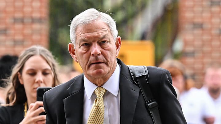Oct 18, 2025; Iowa City, Iowa, USA; Iowa Hawkeyes head coach Kirk Ferentz enters Kinnick Stadium before the game against the Penn State Nittany Lions. Mandatory Credit: Jeffrey Becker-Imagn Images
