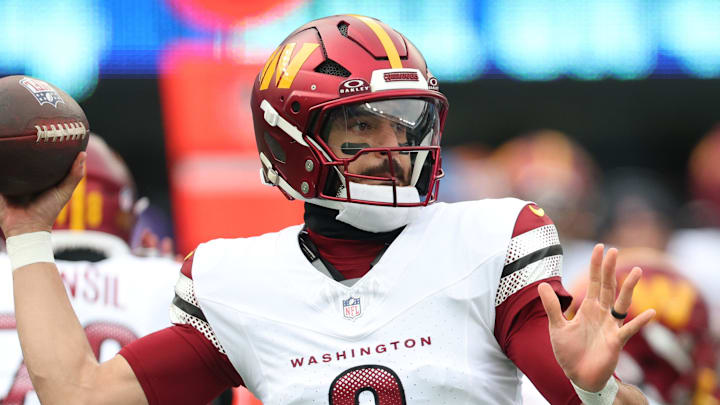 Dec 14, 2025; East Rutherford, New Jersey, USA;  Washington Commanders quarterback Marcus Mariota (8) looks to pass during the first quarter against the New York Giants at MetLife Stadium. Mandatory Credit: Vincent Carchietta-Imagn Images