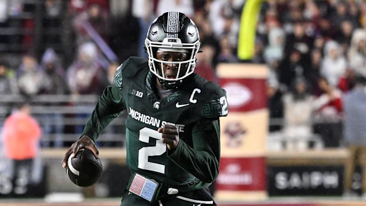 Sep 21, 2024; Chestnut Hill, Massachusetts, USA; Michigan State Spartans quarterback Aidan Chiles (2) runs the ball against the Boston College Eagles during the first half at Alumni Stadium. Mandatory Credit: Eric Canha-Imagn Images