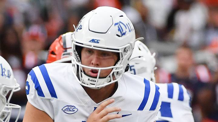 Sep 12, 2026; Champaign, Illinois, USA; Duke Blue Devils quarterback Walker Eget (2) hands the ball to running back CJ Campbell (0) during the second half at Gies Memorial Stadium. Mandatory Credit: Ron Johnson-Imagn Images Sep 12, 2026; Champaign, Illinois, USA; Duke Blue Devils quarterback Walker Eget (2) hands the ball to running back CJ Campbell (0) during the second half at Gies Memorial Stadium. Mandatory Credit: Ron Johnson-Imagn Images