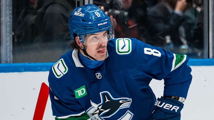 Jan 27, 2026; Vancouver, British Columbia, CAN; Vancouver Canucks forward Conor Garland (8) handles the puck against the San Jose Sharks in the third period at Rogers Arena. Mandatory Credit: Bob Frid-Imagn Images