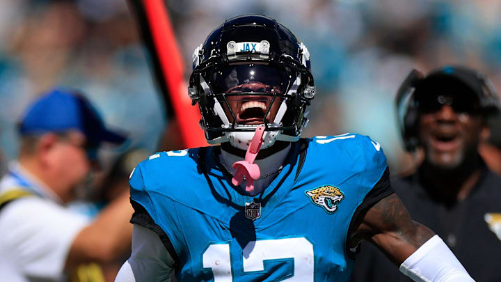Jacksonville Jaguars wide receiver Travis Hunter (12) reacts to his carry during the first quarter of an NFL football matchup, Sunday, Oct. 12, 2025, at EverBank Stadium in Jacksonville, Fla. 