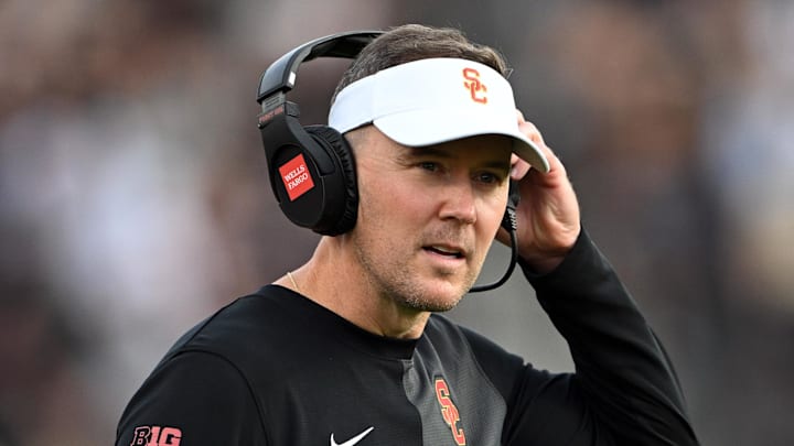 Sep 13, 2025; West Lafayette, Indiana, USA; Southern California Trojans head coach Lincoln Riley stands on the sidelines during the first quarter against the Purdue Boilermakers at Ross-Ade Stadium. Mandatory Credit: Marc Lebryk-Imagn Images