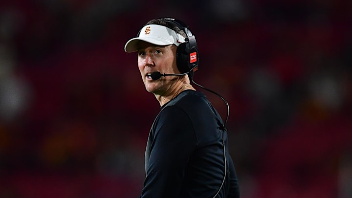 Sep 20, 2025; Los Angeles, California, USA; Southern California Trojans head coach Lincoln Riley watches game action against the Michigan State Spartans during the second half at the Los Angeles Memorial Coliseum. Mandatory Credit: Gary A. Vasquez-Imagn Images