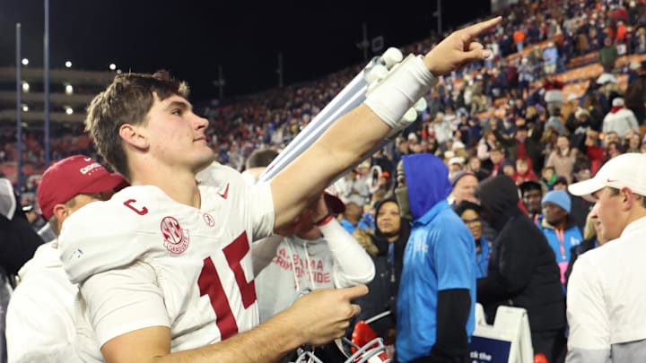 Nov 29, 2025; Auburn, Alabama, USA; Alabama Crimson Tide quarterback Ty Simpson (15) reacts after the game against the Auburn Tigers at Jordan-Hare Stadium. Mandatory Credit: John Reed-Imagn Images