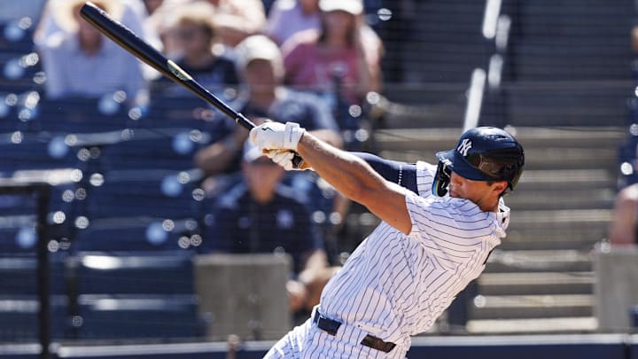 Feb 21, 2026; Tampa, Florida, USA; New York Yankees outfielder Spencer Jones (78) hits a home run against the Detroit Tigers during the second inning in a Spring Training game at George M. Steinbrenner Field. Mandatory Credit: Morgan Tencza-Imagn Images