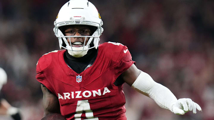 Arizona Cardinals receiver Greg Dortch (4) runs in for a touchdown after a catch against the Jacksonville Jaguars Arizona Cardinals receiver Greg Dortch (4) runs in for a touchdown after a catch against the Jacksonville Jaguars