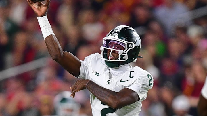 Sep 20, 2025; Los Angeles, California, USA; Michigan State Spartans quarterback Aidan Chiles (2) throws against the Southern California Trojans during the first half at the Los Angeles Memorial Coliseum. Mandatory Credit: Gary A. Vasquez-Imagn Images Sep 20, 2025; Los Angeles, California, USA; Michigan State Spartans quarterback Aidan Chiles (2) throws against the Southern California Trojans during the first half at the Los Angeles Memorial Coliseum. Mandatory Credit: Gary A. Vasquez-Imagn Images