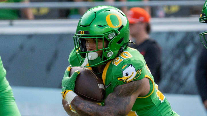 Oregon running back Makhi Hughes carries the ball as the Oregon Ducks host the Oklahoma State Cowboys on Sept. 6, 2025, at Autzen Stadium in Eugene, Oregon.