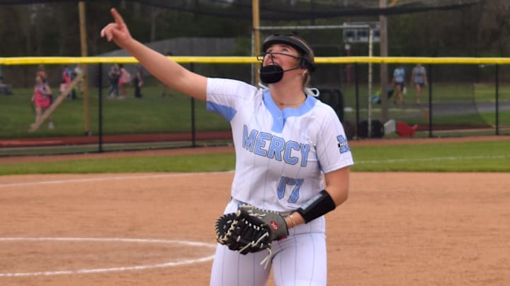Mercy Academy senior Madison Degrella points to a fly ball in foul territory in a game against North Oldham High School April 15, 2026. Mercy, along with Daviess County and Bullitt East, are the best candidates to challenge South Warren.