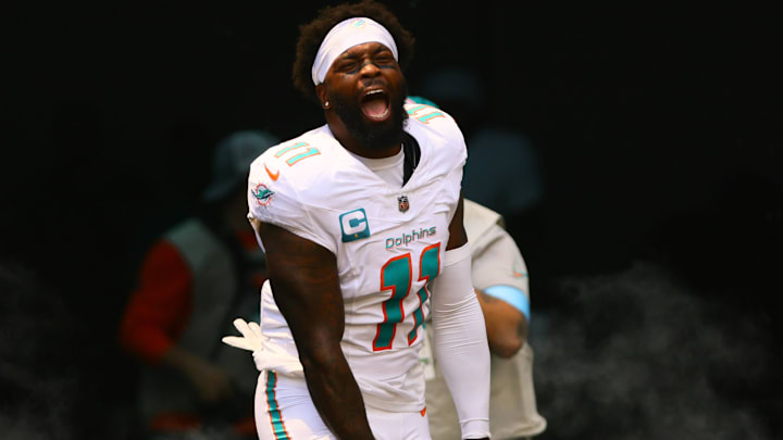 Sep 8, 2024; Miami Gardens, Florida, USA; Miami Dolphins linebacker David Long Jr. (11) runs onto the field before the game against the Jacksonville Jaguars at Hard Rock Stadium. Mandatory Credit: Sam Navarro-Imagn Images